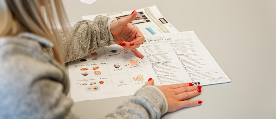 Dietitian going over nutrition chart