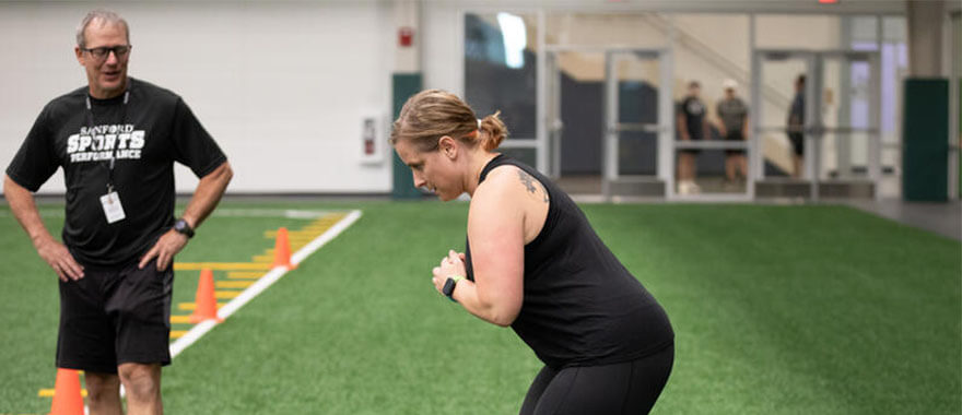 Woman training with coach
