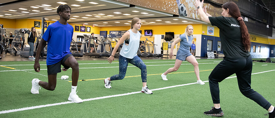 Athletes training during a strength and conditioning program