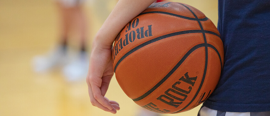 Athlete holding a basketball