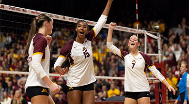 Volleyball players celebrating