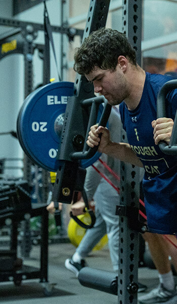 Person lifting weights in Irivine weight room