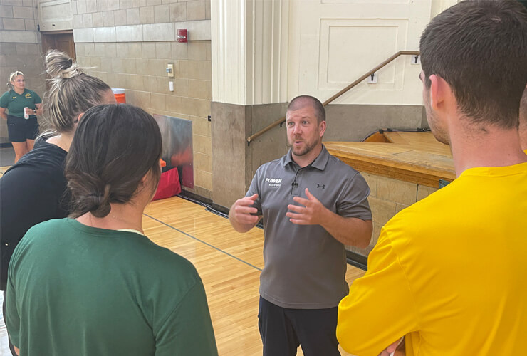 Andy Gillham working with athletes and coaches