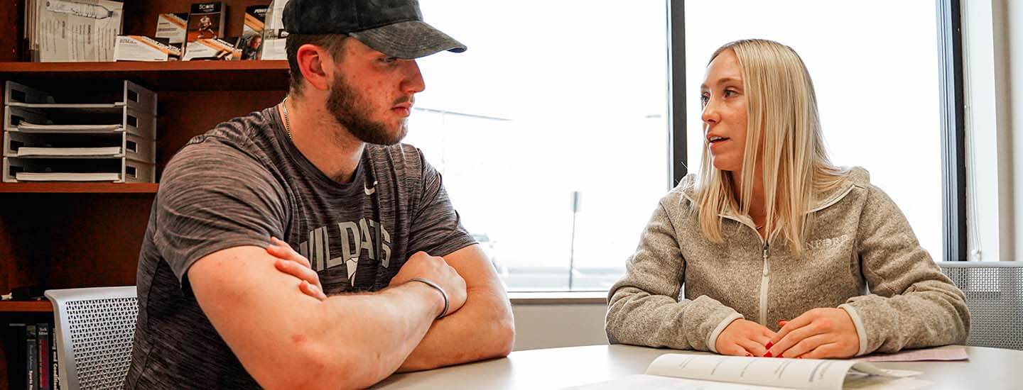 Natasha Hansen discussing sports nutrition with Ben Sinnot