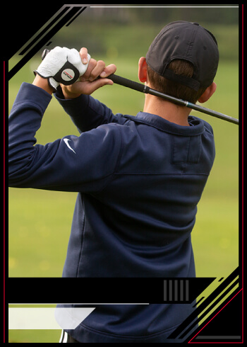 Youth athlete during the follow through of their golf swing